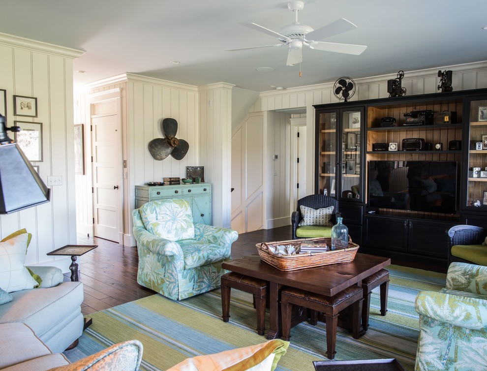 This is an example of a transitional family room in Charleston.