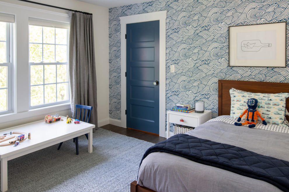 This is an example of a mid-sized eclectic kids' room for boys in Boston with white walls and dark hardwood floors.