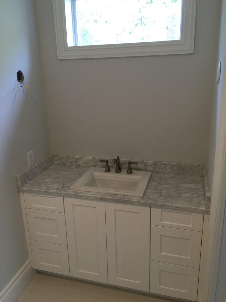 Transitional home design photo in Miami