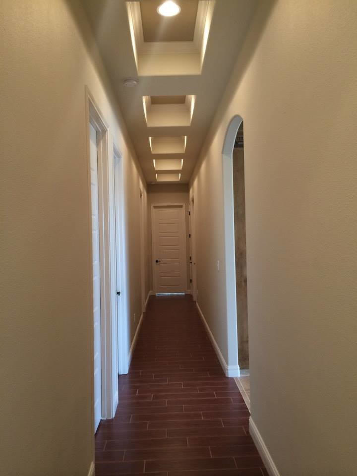 Hallway - rustic hallway idea in Austin