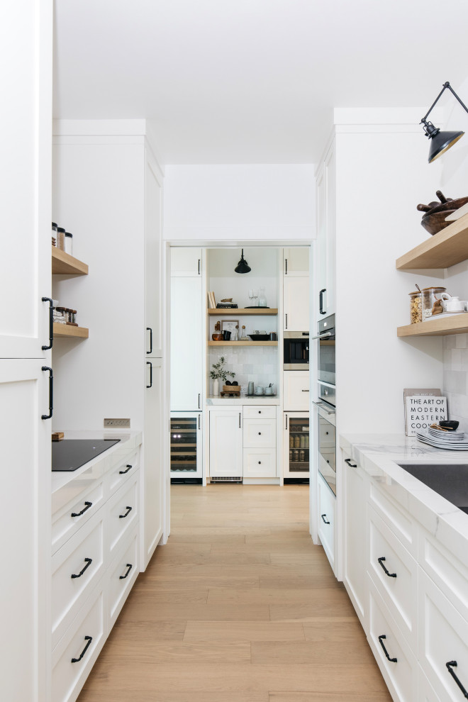 Example of a transitional kitchen design in Phoenix