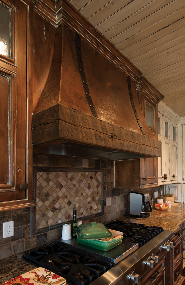 Inspiration for a large rustic l-shaped dark wood floor open concept kitchen remodel with recessed-panel cabinets, medium tone wood cabinets, stone slab backsplash, stainless steel appliances and an island