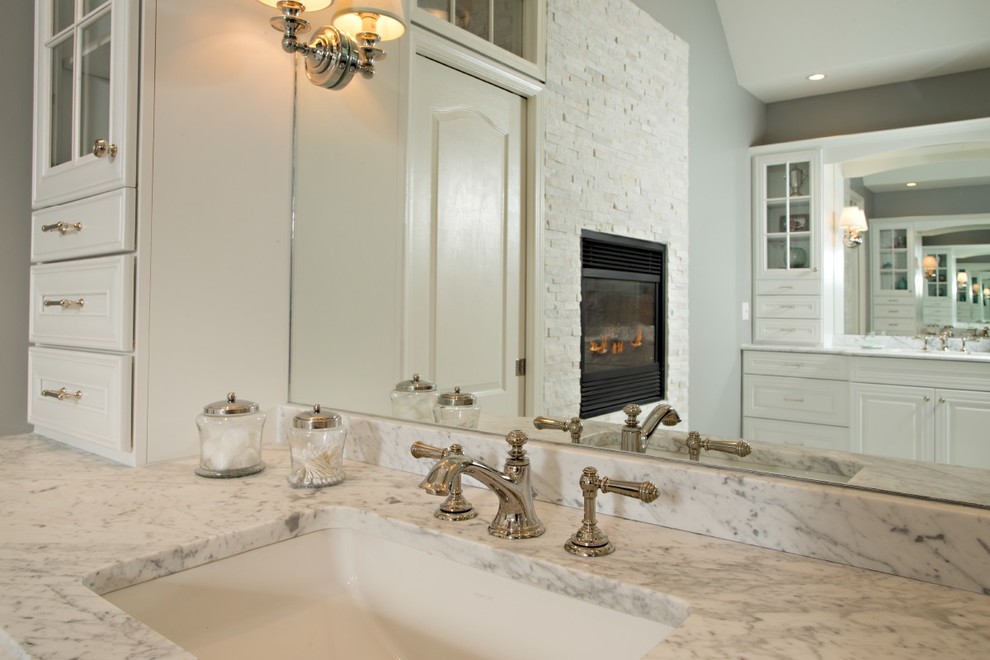 Design ideas for a large transitional master bathroom in Detroit with an undermount sink, white cabinets, marble benchtops, a double shower, a two-piece toilet, white tile, grey walls, marble floors, raised-panel cabinets, marble and white floor.
