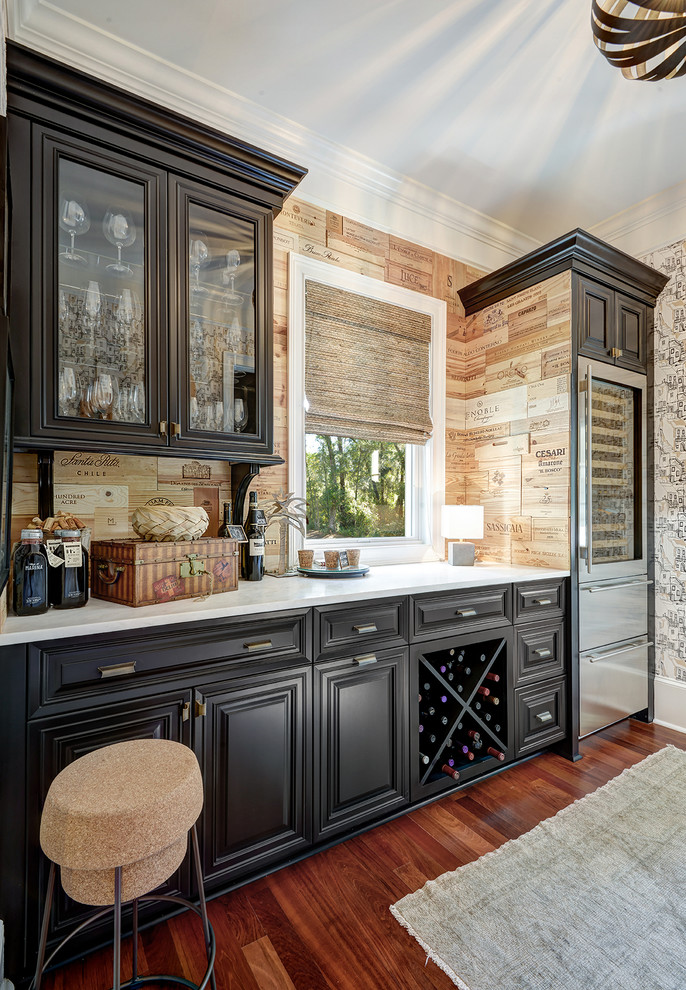 This is an example of a mid-sized transitional wine cellar in Charleston with dark hardwood floors, diamond bins and brown floor.
