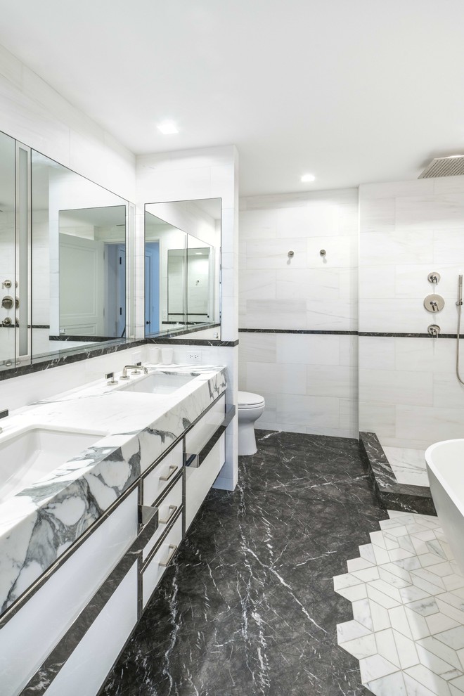 Design ideas for a contemporary master bathroom in New York with flat-panel cabinets, white cabinets, an open shower, white tile, an undermount sink, multi-coloured floor, an open shower and multi-coloured benchtops.