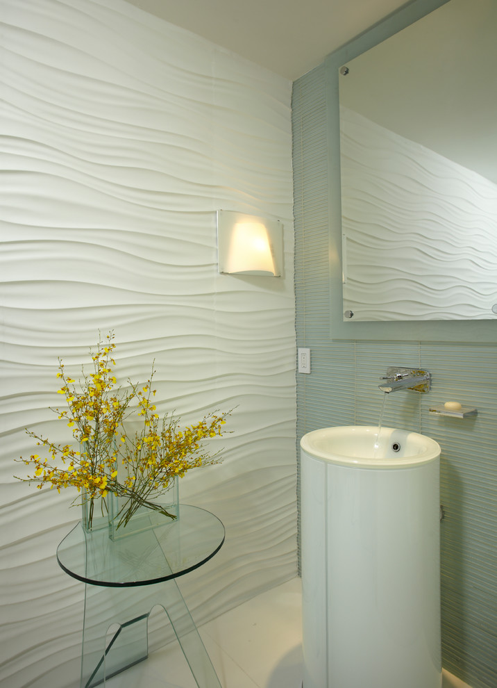 Example of a small minimalist marble floor powder room design in Miami with white walls