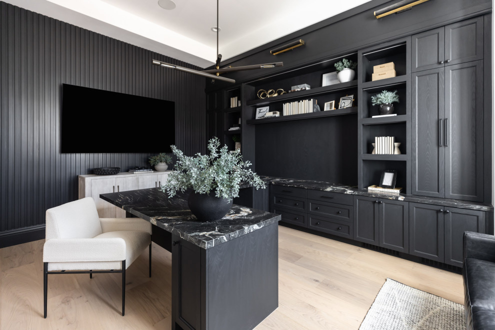 Worth the Wait - Example of a transitional freestanding desk light wood floor, beige floor and shiplap wall home office design in Phoenix with black walls