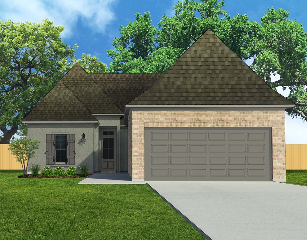 Example of a transitional home design design in New Orleans