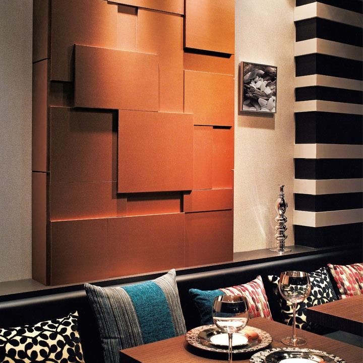 This is an example of a large asian dining room in Other with brown walls.