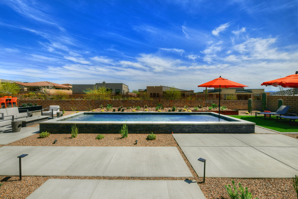 Inspiration for a mid-sized modern pool remodel in Phoenix