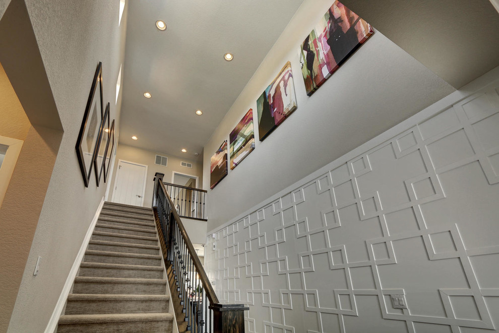 Mid-sized transitional porcelain tile hallway photo in Denver with white walls
