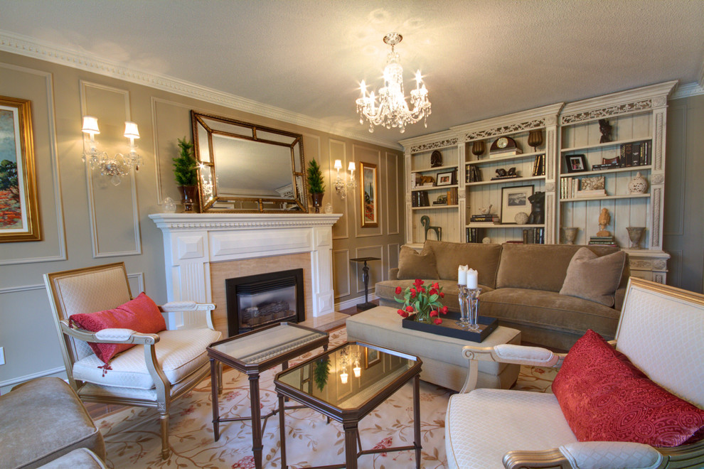 Inspiration for a large traditional living room in Toronto with a standard fireplace.
