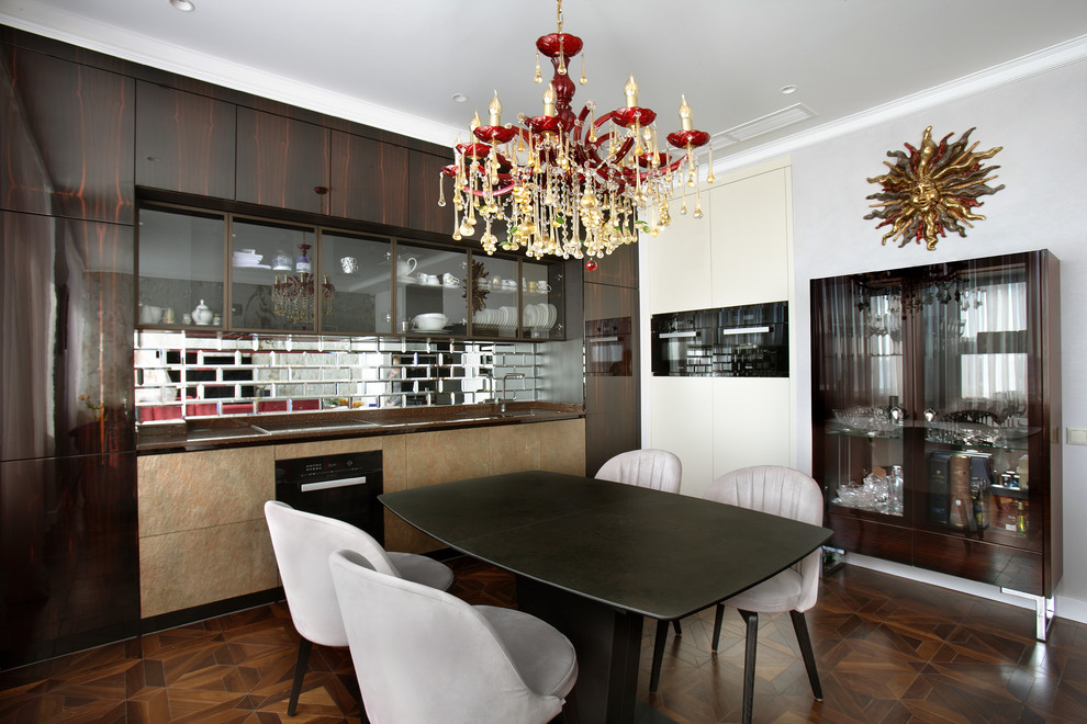 Mid-sized contemporary l-shaped eat-in kitchen in Moscow with an undermount sink, flat-panel cabinets, dark wood cabinets, solid surface benchtops, mirror splashback, black appliances, medium hardwood floors, brown floor and brown benchtop.
