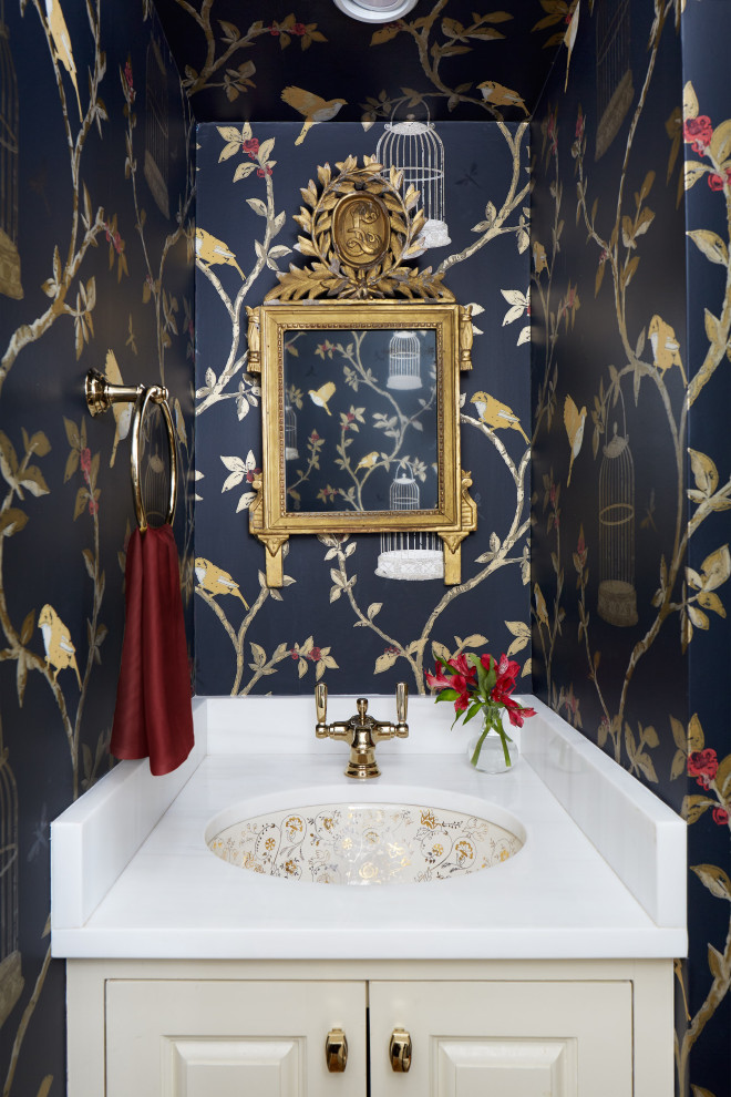 #mcleanrenovation - Luxurious Powder Room - Opulent powder room with navy and gold wallpaper and antique mirror

Photo by Stacy Zarin Goldberg Photography