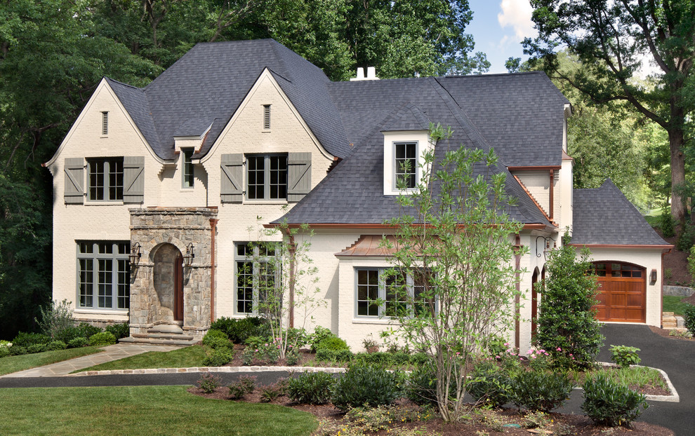 Photo of a traditional exterior in Other with stone veneer.
