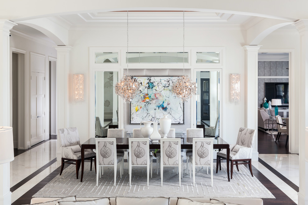 Design ideas for a large transitional dining room in Miami with marble floors, white walls and no fireplace.