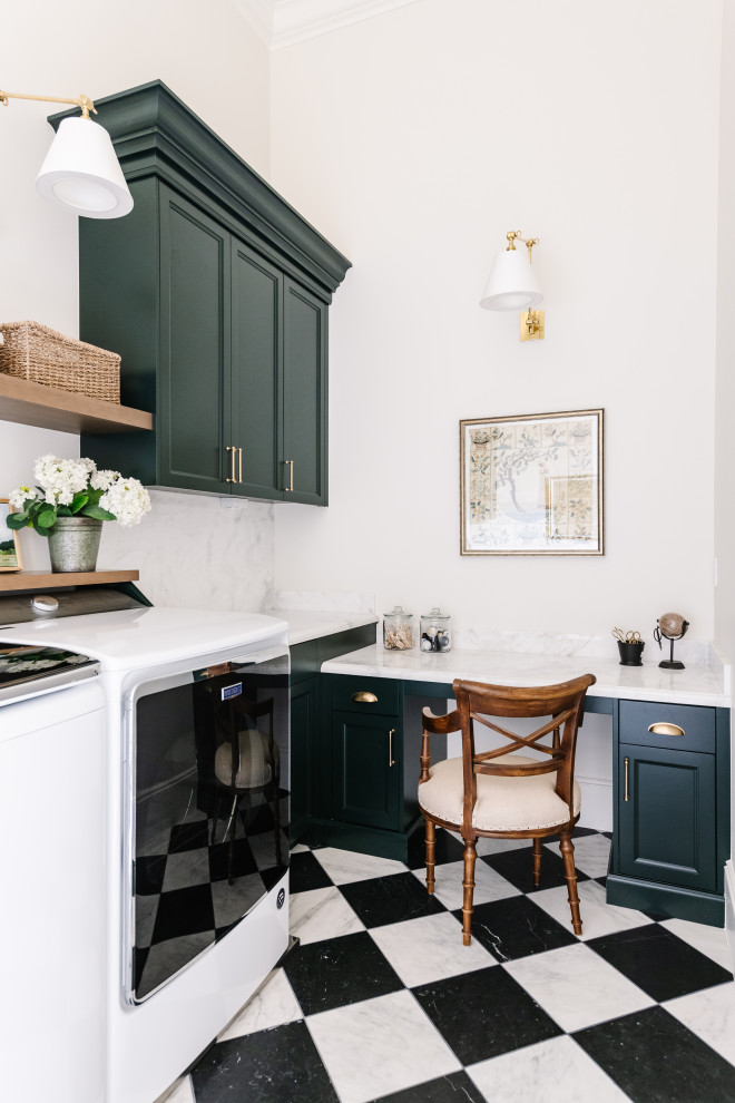 Photo of a traditional laundry room in Salt Lake City with a drop-in sink, shaker cabinets, green cabinets, white walls and marble floors.