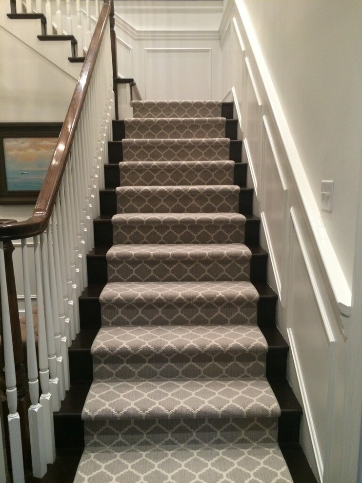 Inspiration for a large transitional carpeted l-shaped staircase in Chicago with carpet risers.
