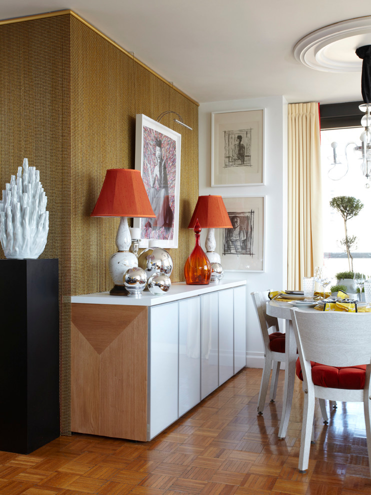 Inspiration for an eclectic dining room in New York with medium hardwood floors.