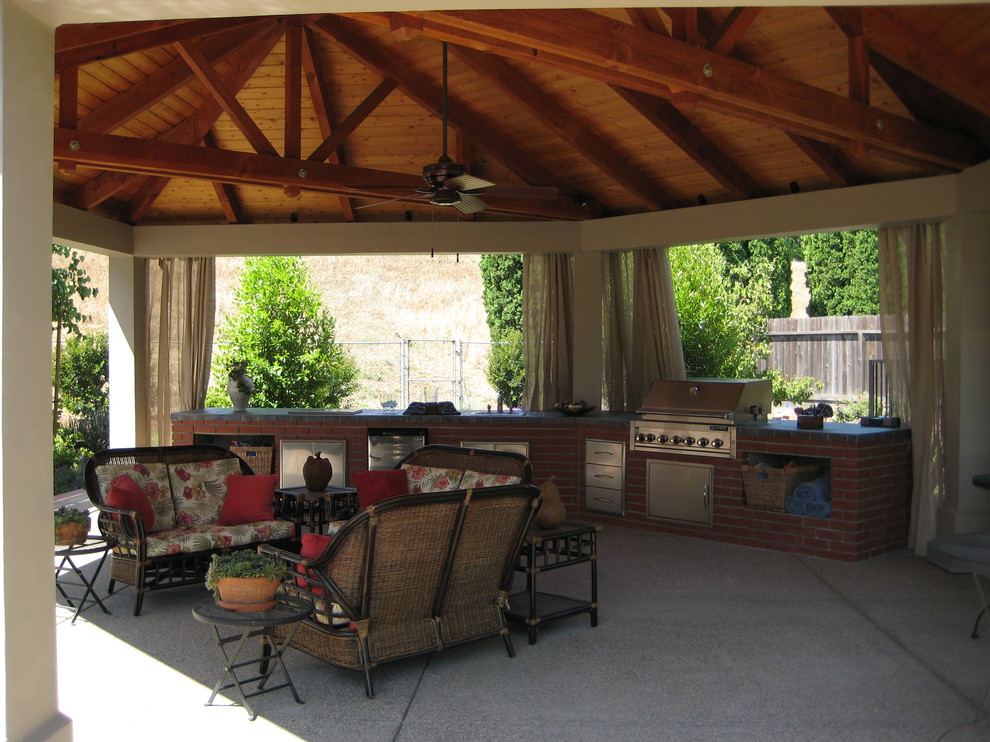 Photo of a mid-sized arts and crafts backyard patio in San Francisco with an outdoor kitchen, decking and a gazebo/cabana.