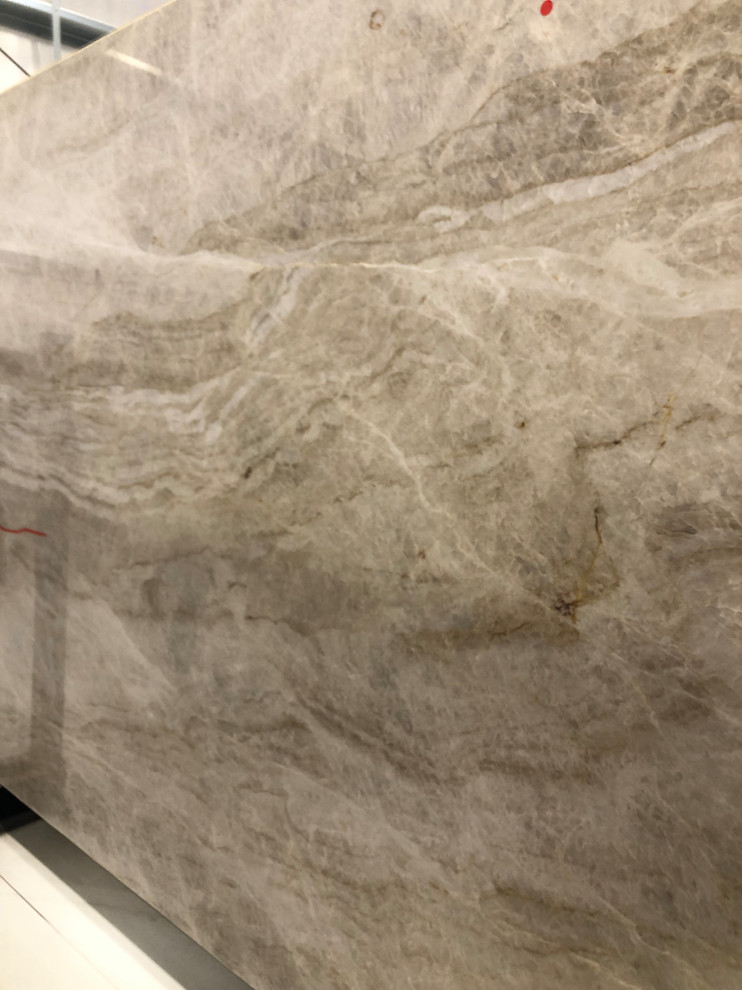 How often does Taj Mahal quartzite need to be sealed vs granite?