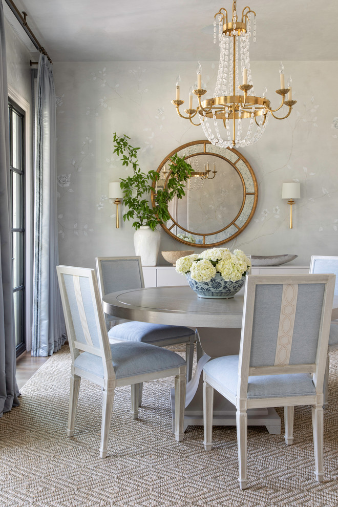 Inspiration for a mid-sized transitional separate dining room in Houston with beige walls, medium hardwood floors and brown floor.