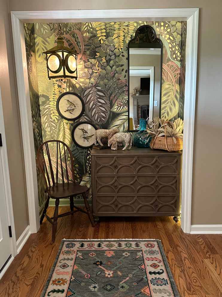 Design ideas for a transitional entryway in Other with medium hardwood floors and wallpaper.
