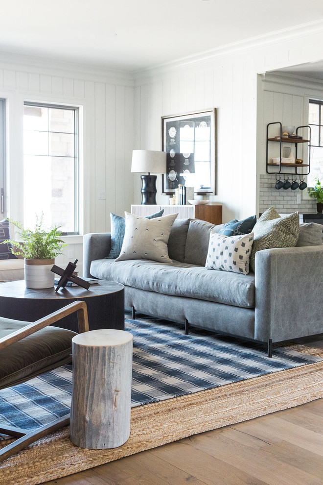 Large cottage open concept light wood floor living room photo in Salt Lake City with white walls
