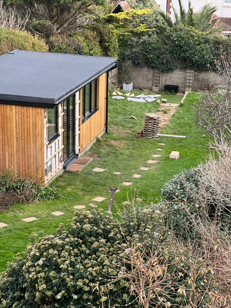 Outbuilding makeover and garden landscaping