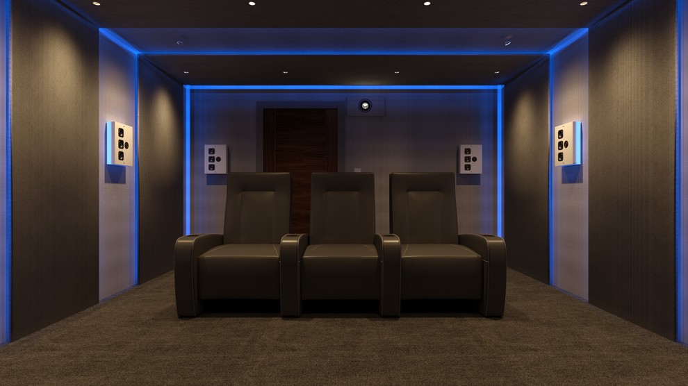 Mid-sized contemporary home theatre in Sussex.