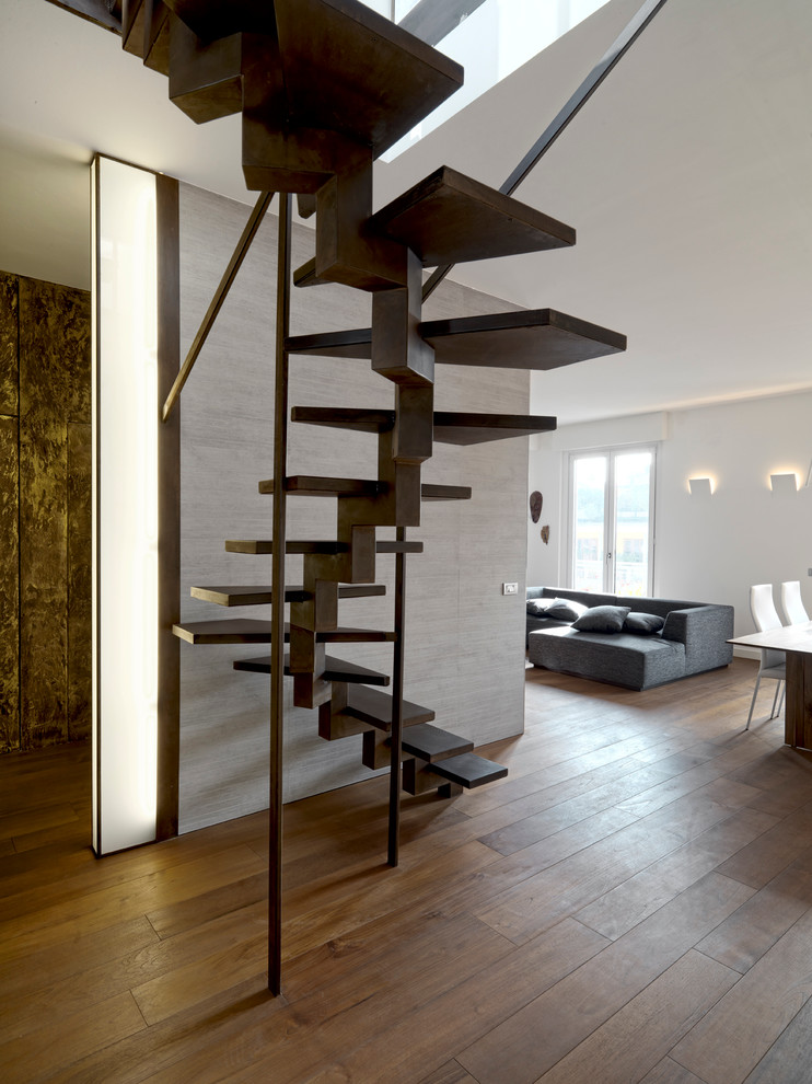 Inspiration for a small contemporary metal spiral staircase in Milan with open risers.