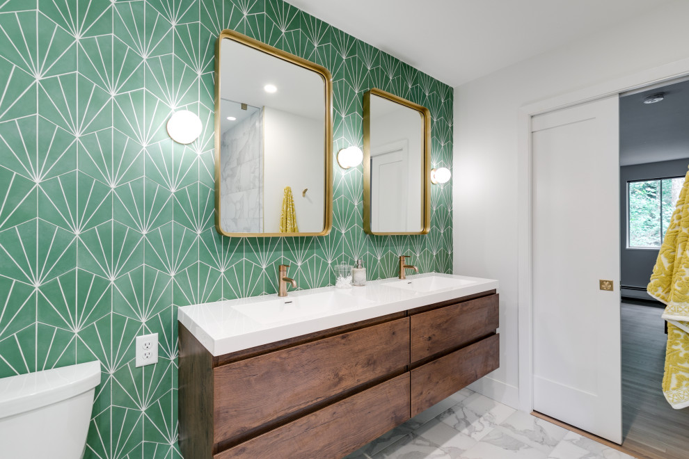 Mid-sized midcentury master bathroom in Richmond with flat-panel cabinets, medium wood cabinets, a curbless shower, a one-piece toilet, green tile, ceramic tile, white walls, marble floors, an integrated sink, solid surface benchtops, white floor, an open shower, white benchtops, a double vanity and a floating vanity.