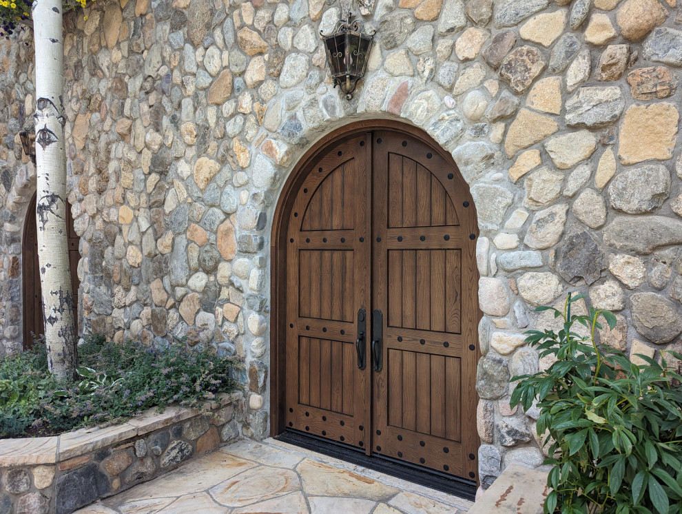 Mountain style entryway photo in Denver
