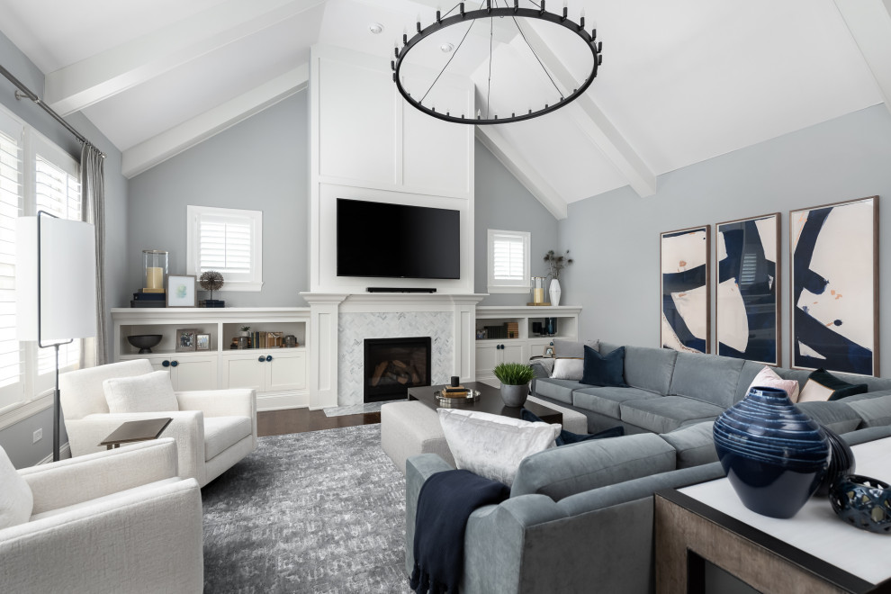 This is an example of a transitional family room in Chicago.