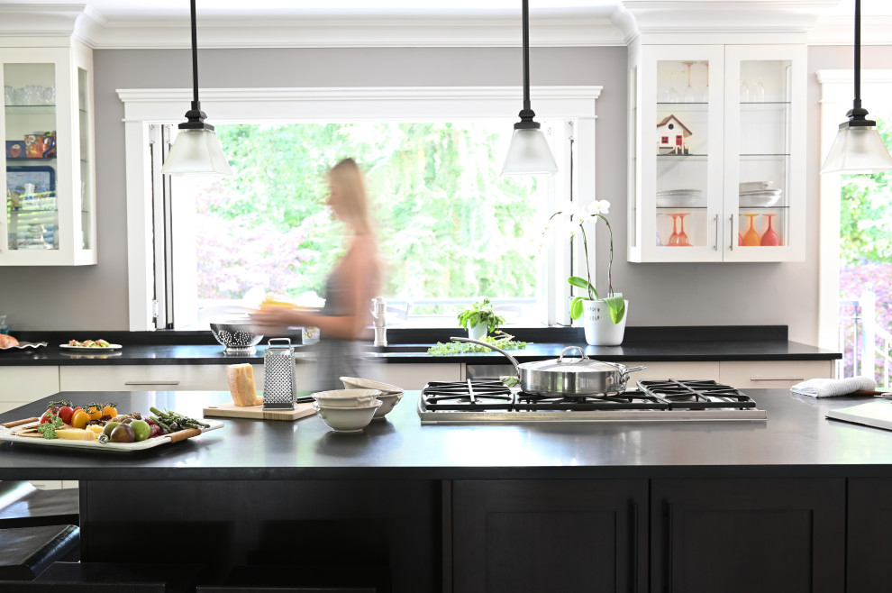 Example of a transitional kitchen design in Vancouver