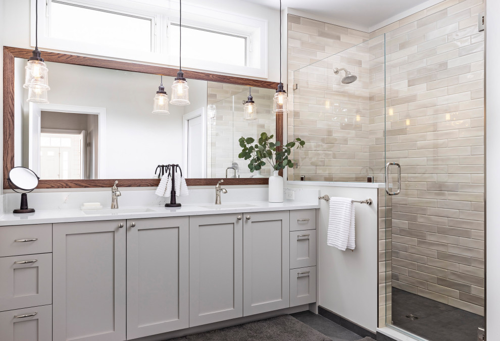 Large transitional master bathroom in Detroit with beige tile, white benchtops, a double vanity, a built-in vanity, shaker cabinets, grey cabinets, an alcove shower, white walls, an integrated sink, grey floor and a hinged shower door.