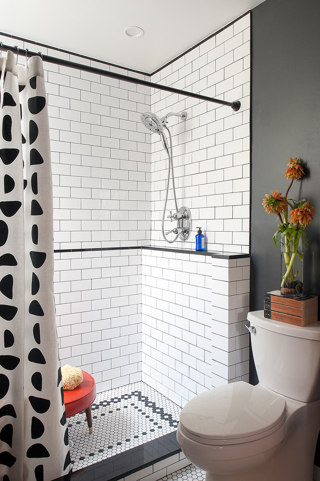 Photo of a transitional bathroom in Philadelphia with a corner shower, a two-piece toilet, white tile, subway tile, grey walls, mosaic tile floors, white floor and a shower curtain.