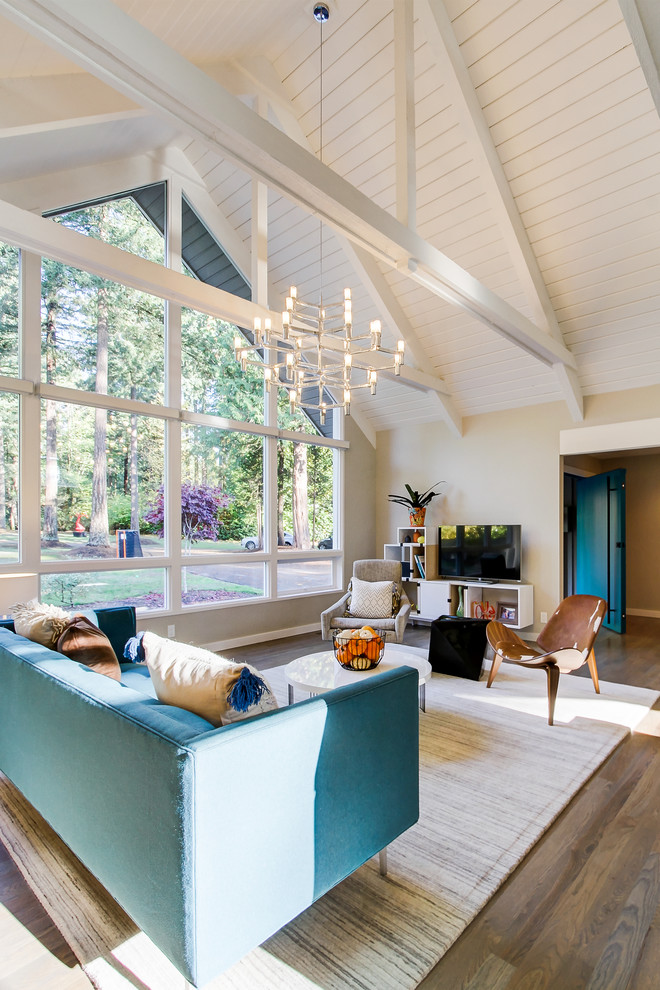 Large trendy open concept and formal dark wood floor and brown floor living room photo in Seattle with beige walls and a two-sided fireplace