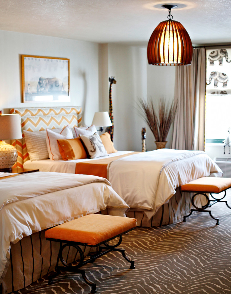 Inspiration for a large guest bedroom in New York with beige walls, carpet and no fireplace.