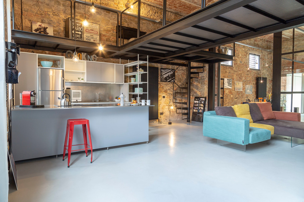 Design ideas for an industrial kitchen in Florence with concrete floors.