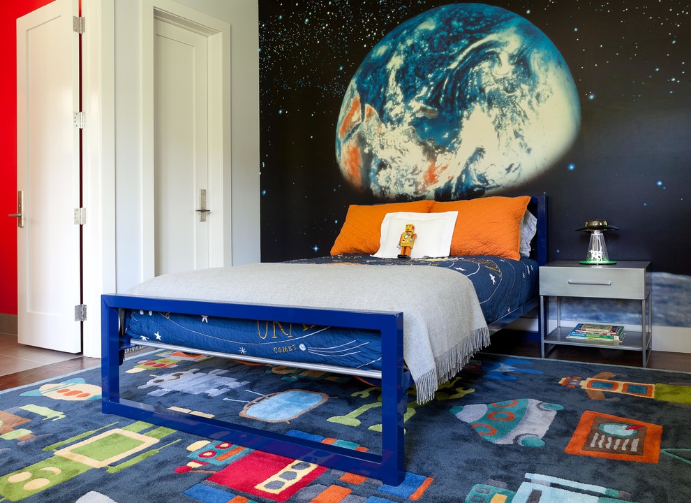 This is an example of a contemporary kids' bedroom for kids 4-10 years old and boys in New York with multi-coloured walls.