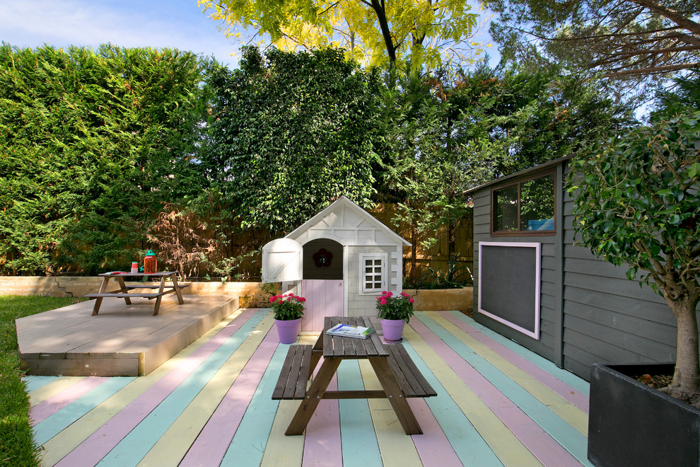 Photo of a transitional backyard deck in Sydney.