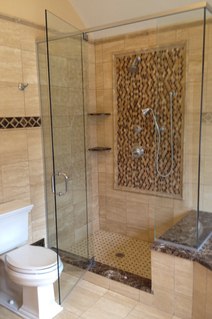 Inspiration for a large transitional drop-in bathtub remodel in Philadelphia with an undermount sink and marble countertops