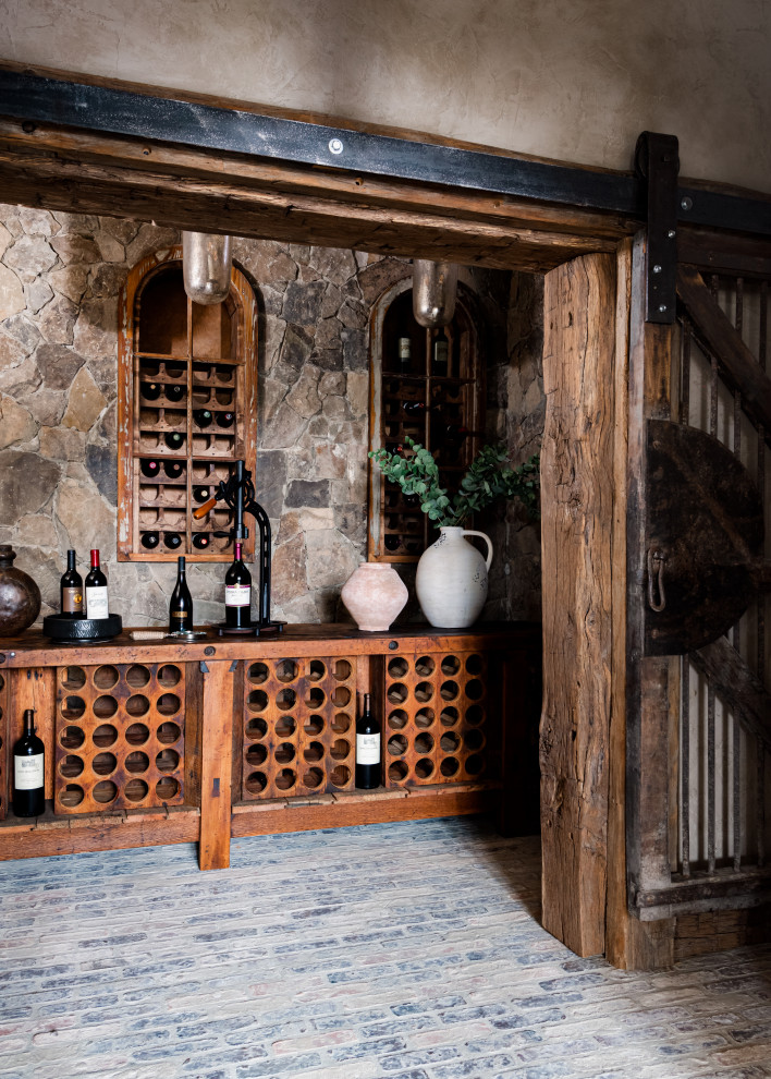 Beach style wine cellar photo in Raleigh