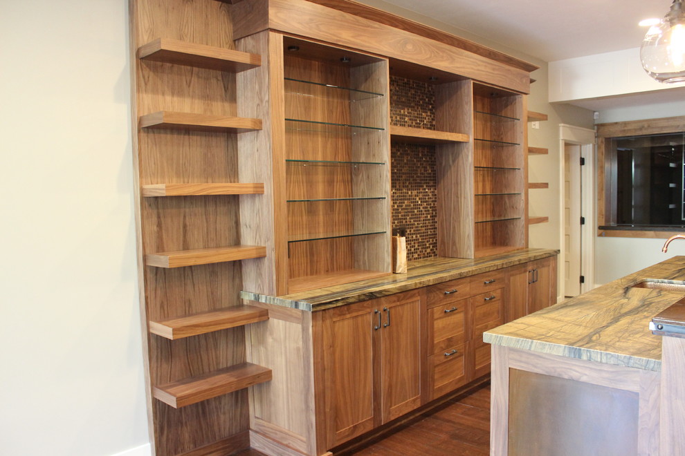 Example of a large transitional home design design in Salt Lake City