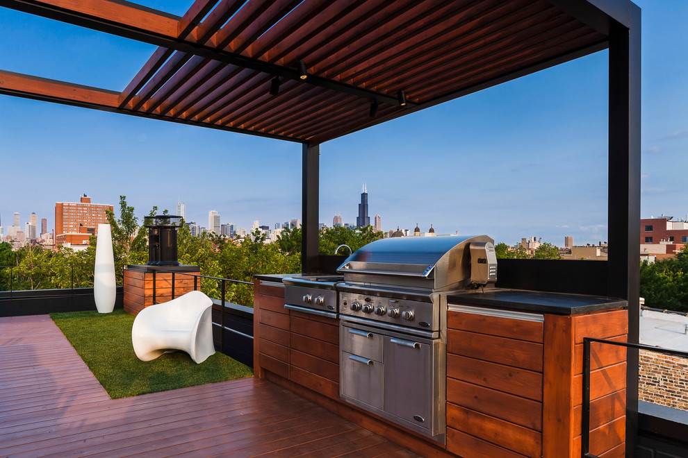 Photo of a contemporary rooftop deck in Chicago with a pergola.