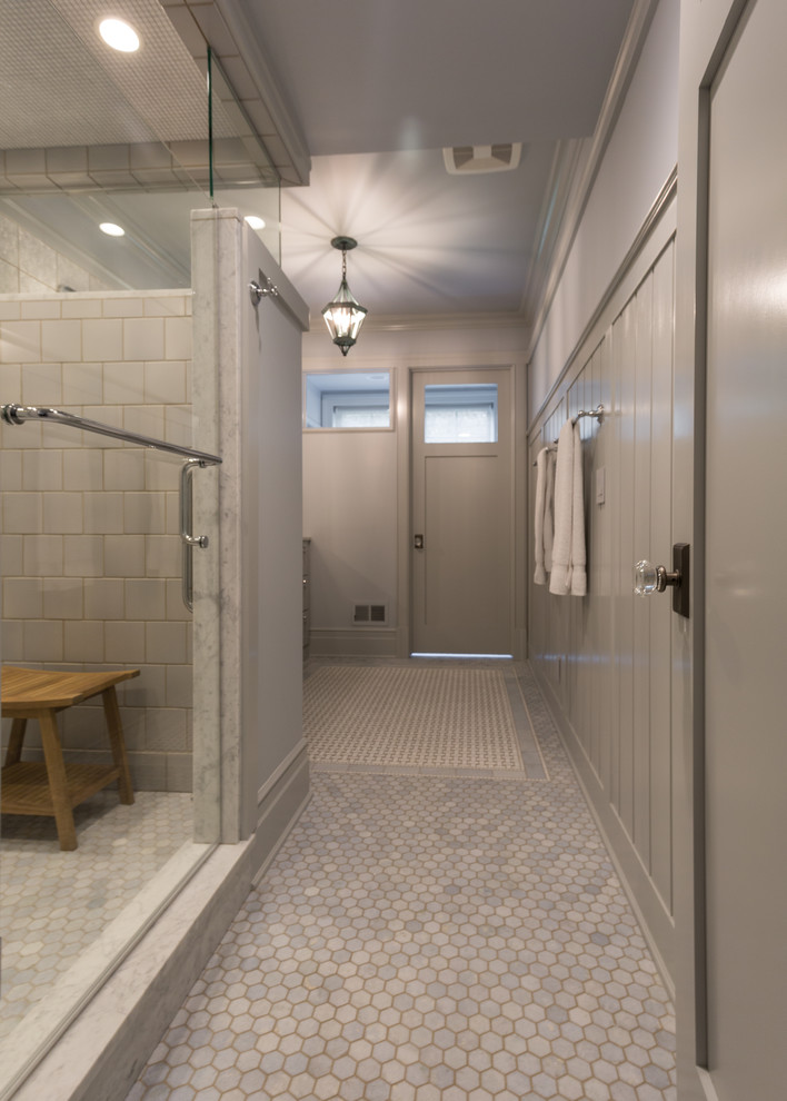 Large traditional master bathroom in Milwaukee with an alcove shower, gray tile, mosaic tile, grey walls, mosaic tile floors, marble benchtops, recessed-panel cabinets, grey cabinets and an undermount sink.
