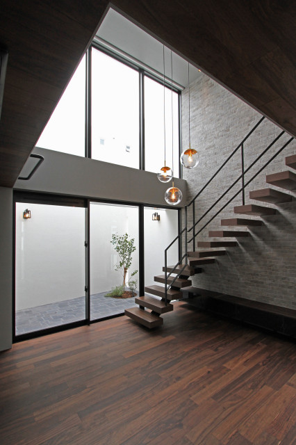 経塚の家 moderne-salon