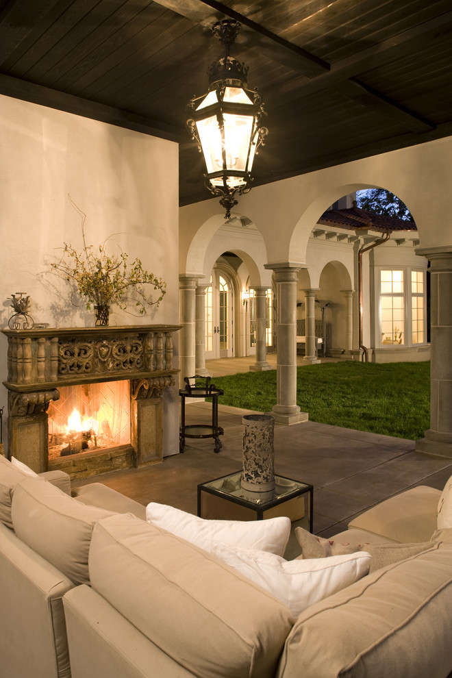Photo of a mediterranean patio in Minneapolis with a fire feature.