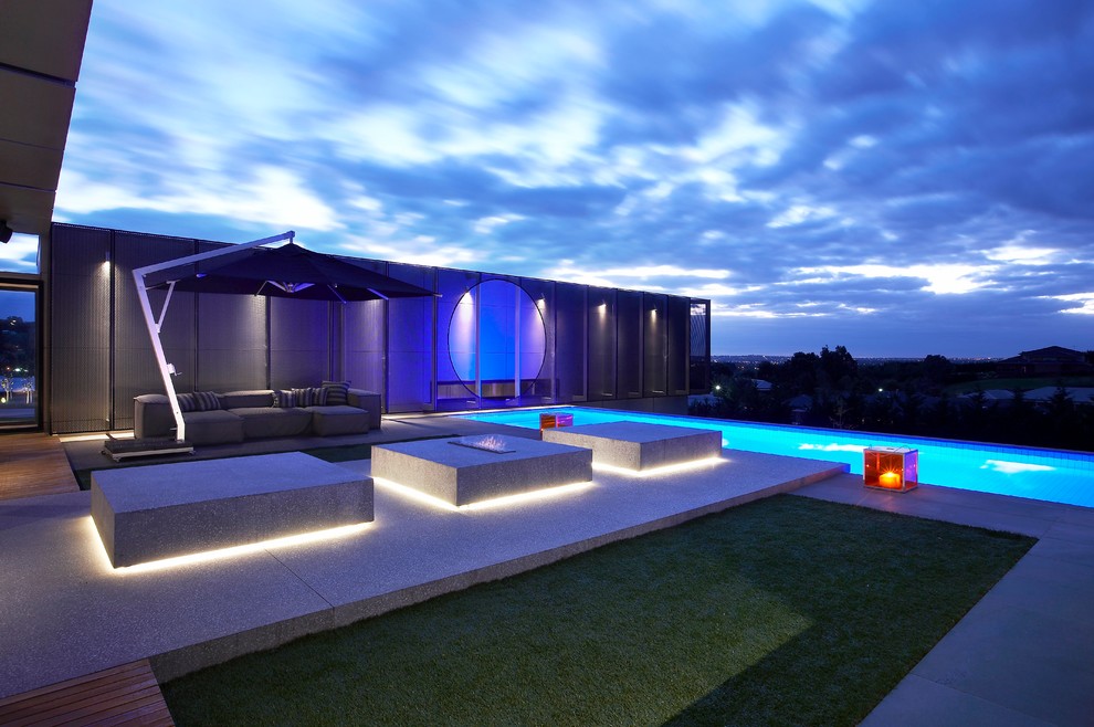 Photo of a contemporary rectangular pool in Melbourne.